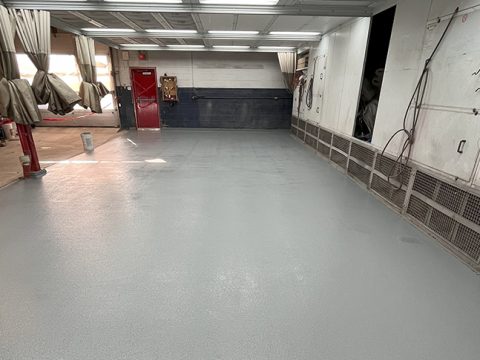 Repair of a car body shop garage slab and waterproofing